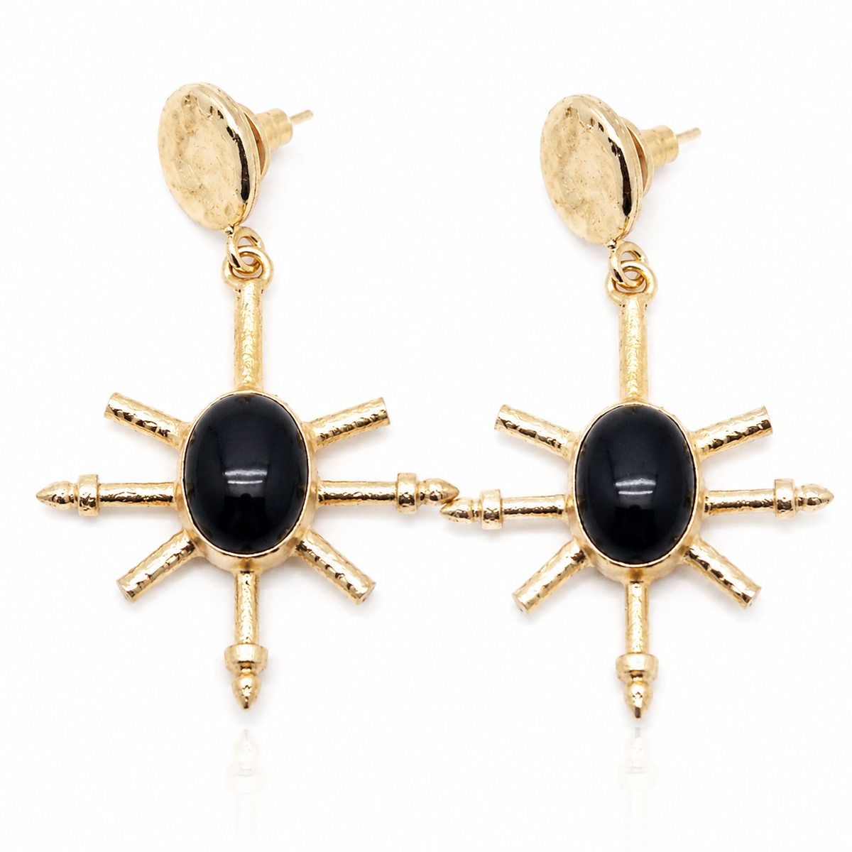 Gold-plated statement earrings with black onyx centers and spike details.