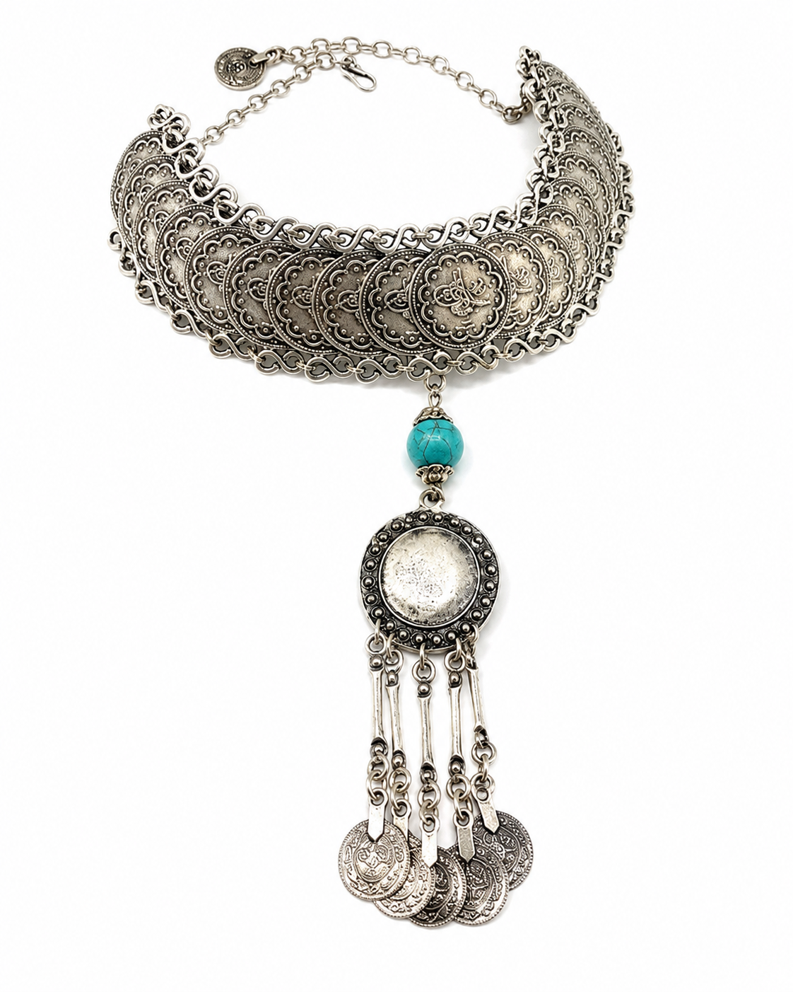 Silver-tone coin choker necklace with a turquoise accent and tassel drop.