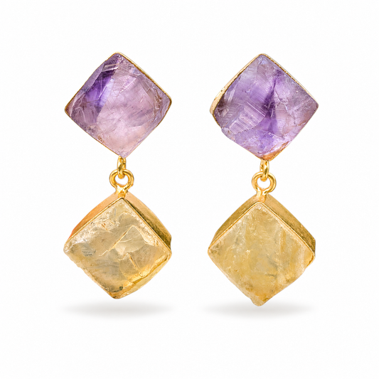 Pair of gold-plated drop earrings with faceted purple and golden stones.