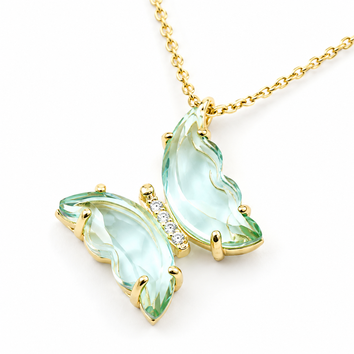 Close view of the light blue butterfly pendant with gold-tone details.