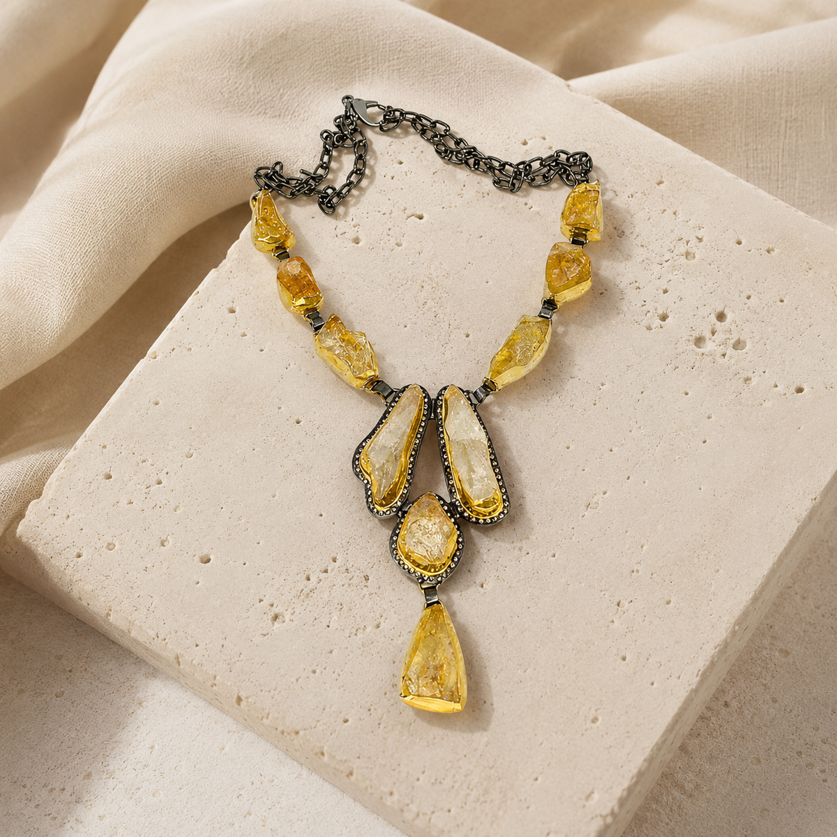 Raw citrine necklace with a sculptural pendant design.