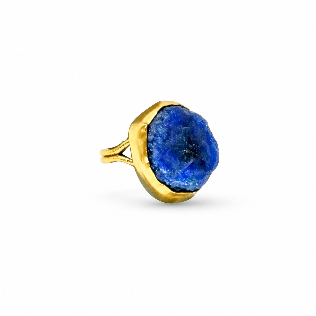 Raw lapis lazuli statement ring with a gold-plated setting.
