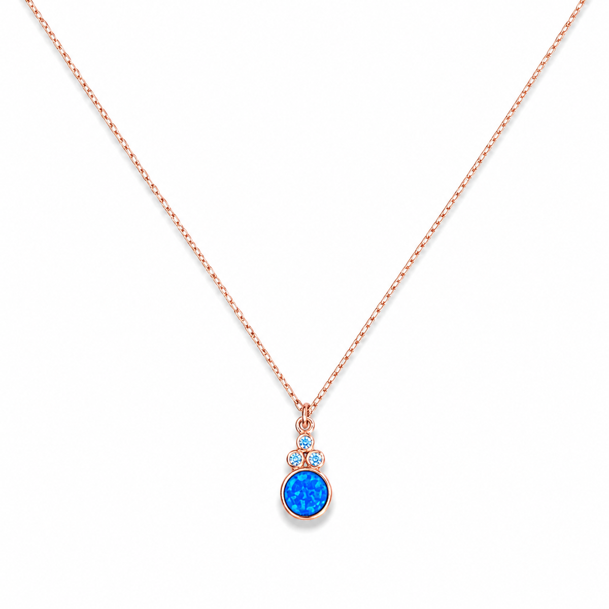 Blue opal pendant necklace with a rose gold-tone chain on a white background.