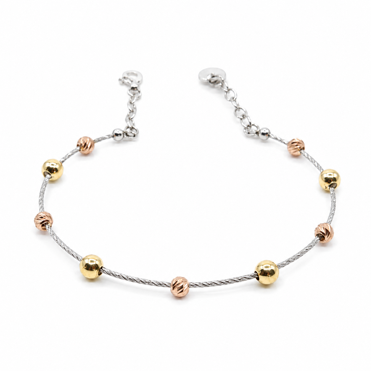 Dorika bracelet with a slim silver-tone cable chain and mixed metallic beads.