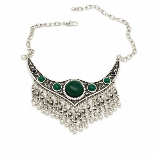 Silver-tone collar necklace with green stones and fringe chain drops.