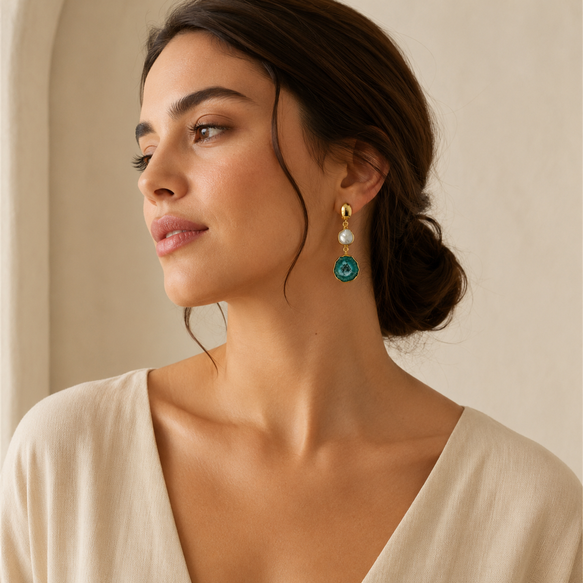Gold-plated drop earrings with a baroque pearl and green agate pendant.