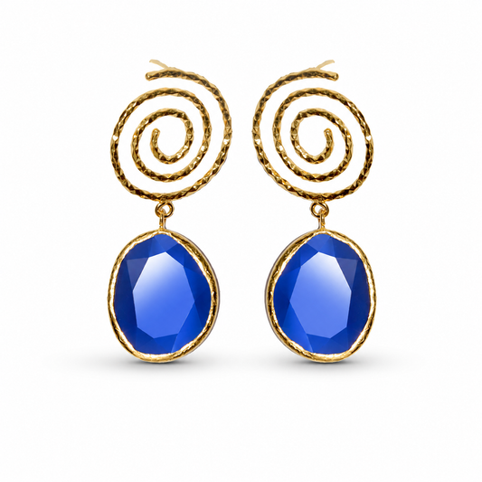 Gold-tone spiral drop earrings with faceted navy blue stones.