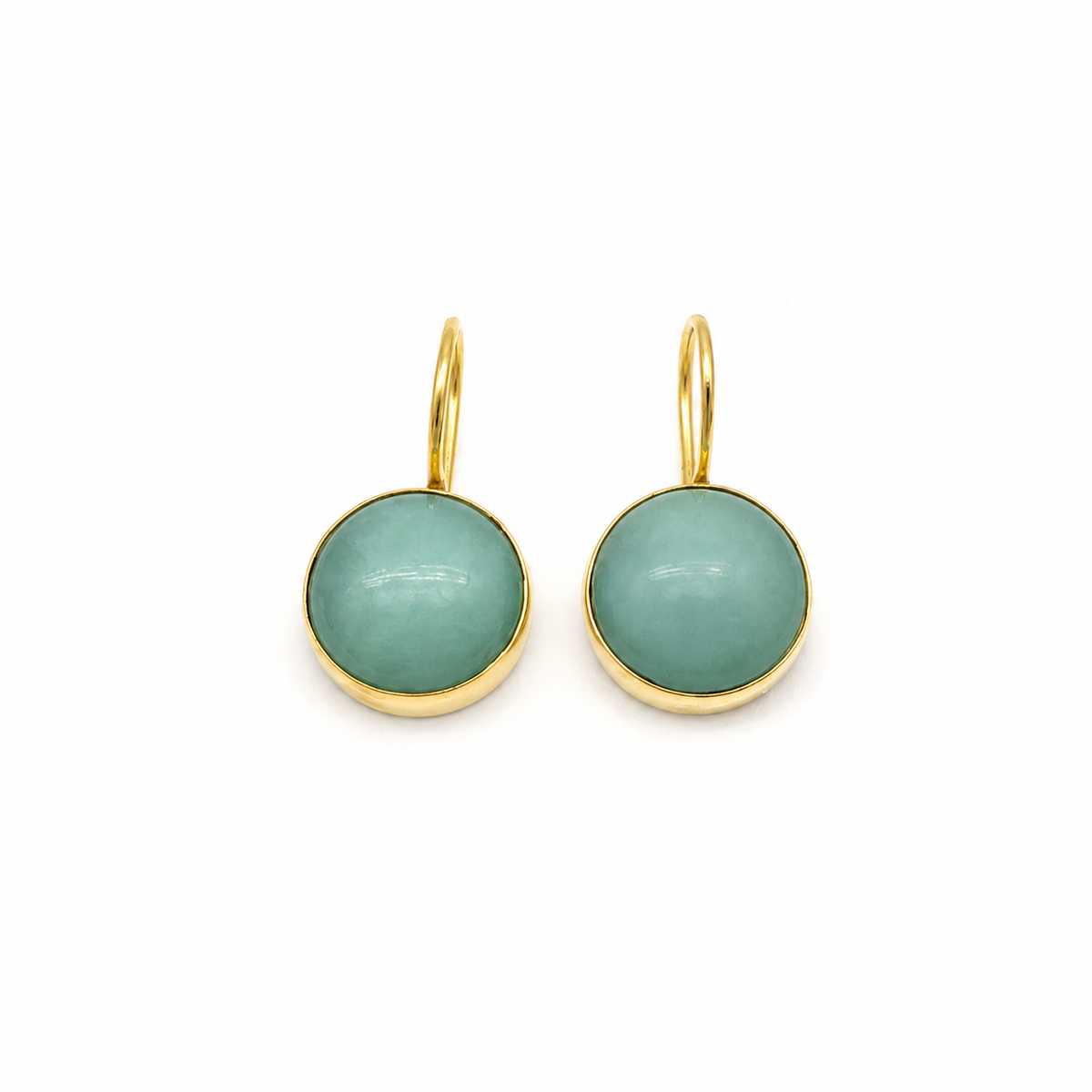 Pair of clear quartz drop earrings with a polished gold-plated setting.