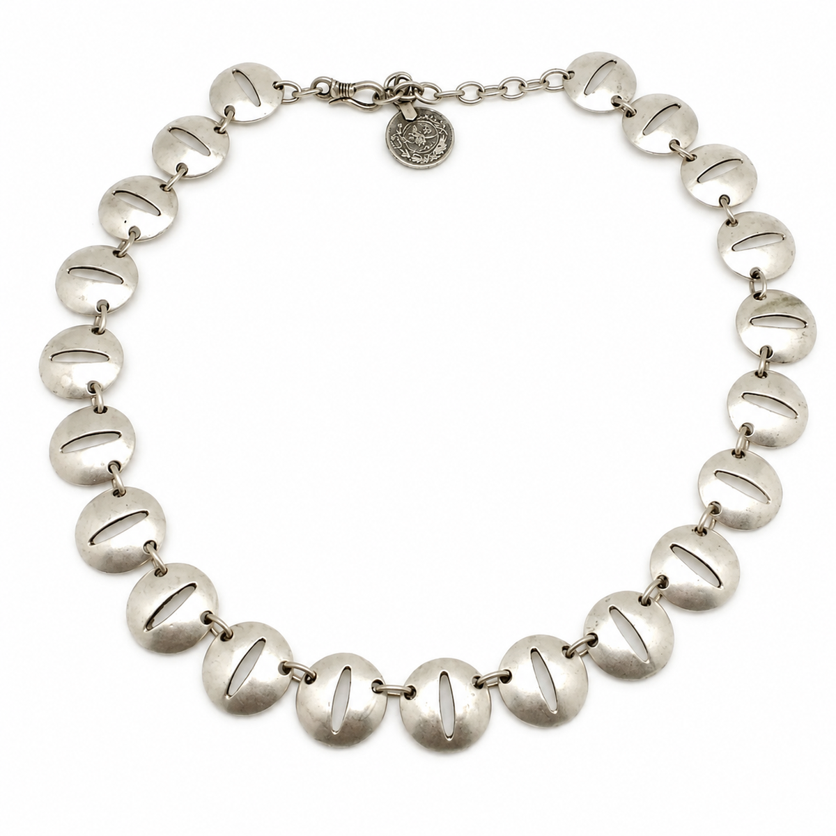 Silver-tone necklace with oval disc links and a polished finish.