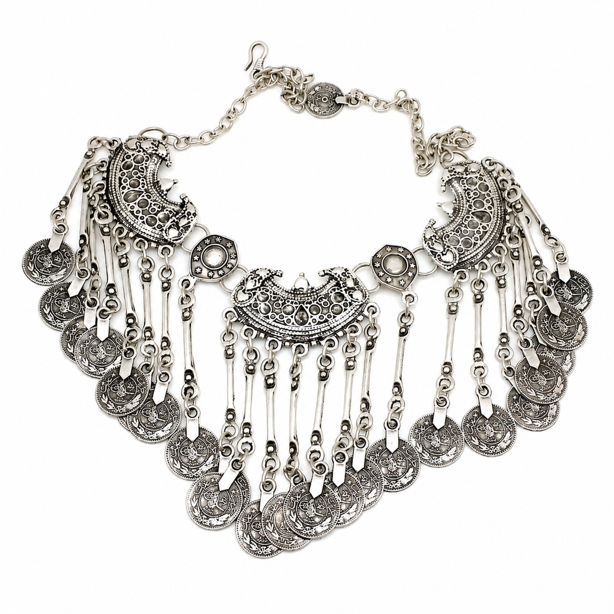 Silver-tone ornate bib necklace with layered coin fringe and crescent details.