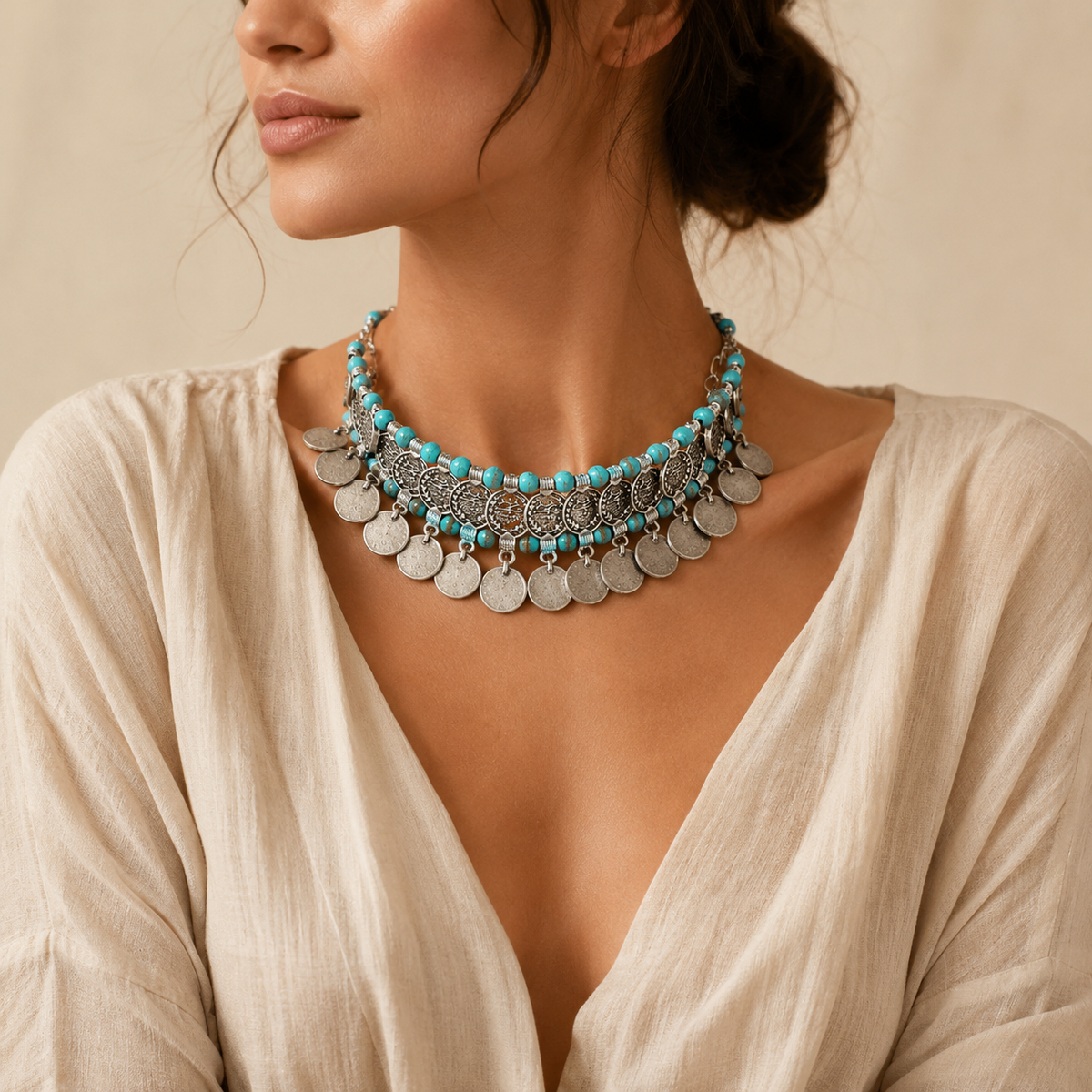 Statement choker necklace with turquoise beads and coin fringe.