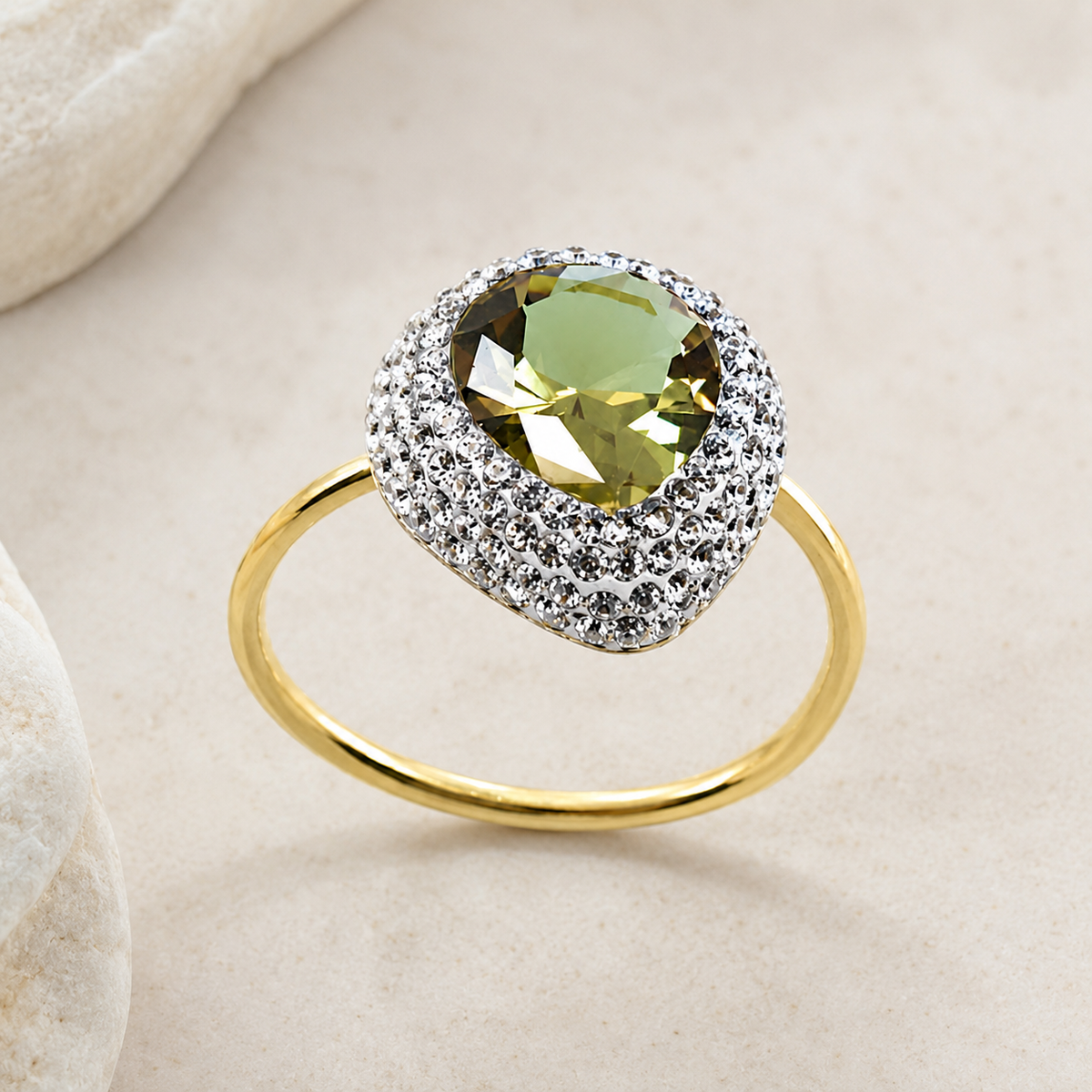 Angled view of a green heart ring with a sparkling CZ halo.