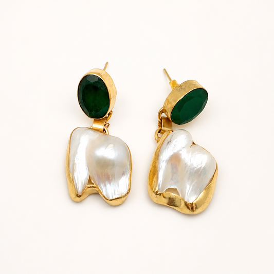 Gold-tone drop earrings with deep green oval stones and baroque pearl drops.