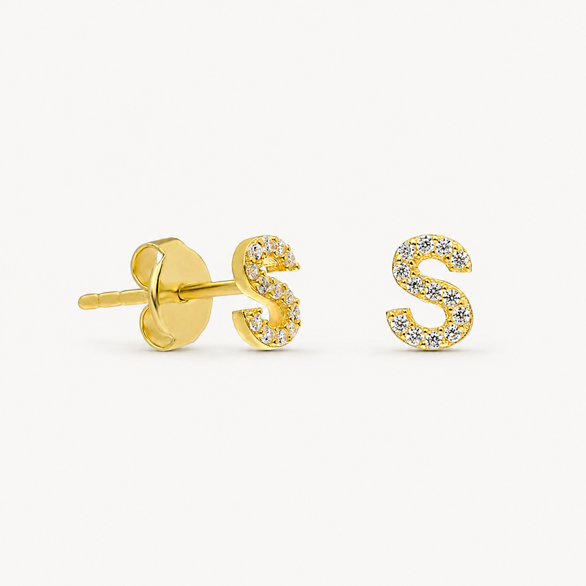 Gold-tone initial stud earring with sparkling CZ accents.