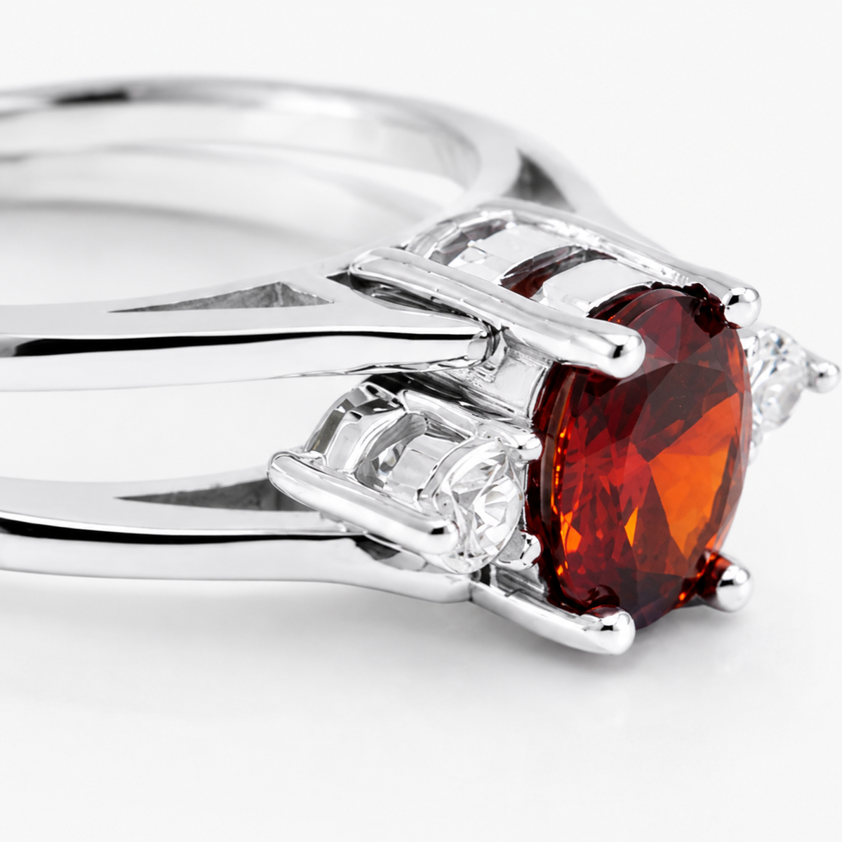 Close view of the ruby stone and polished setting on the ring.