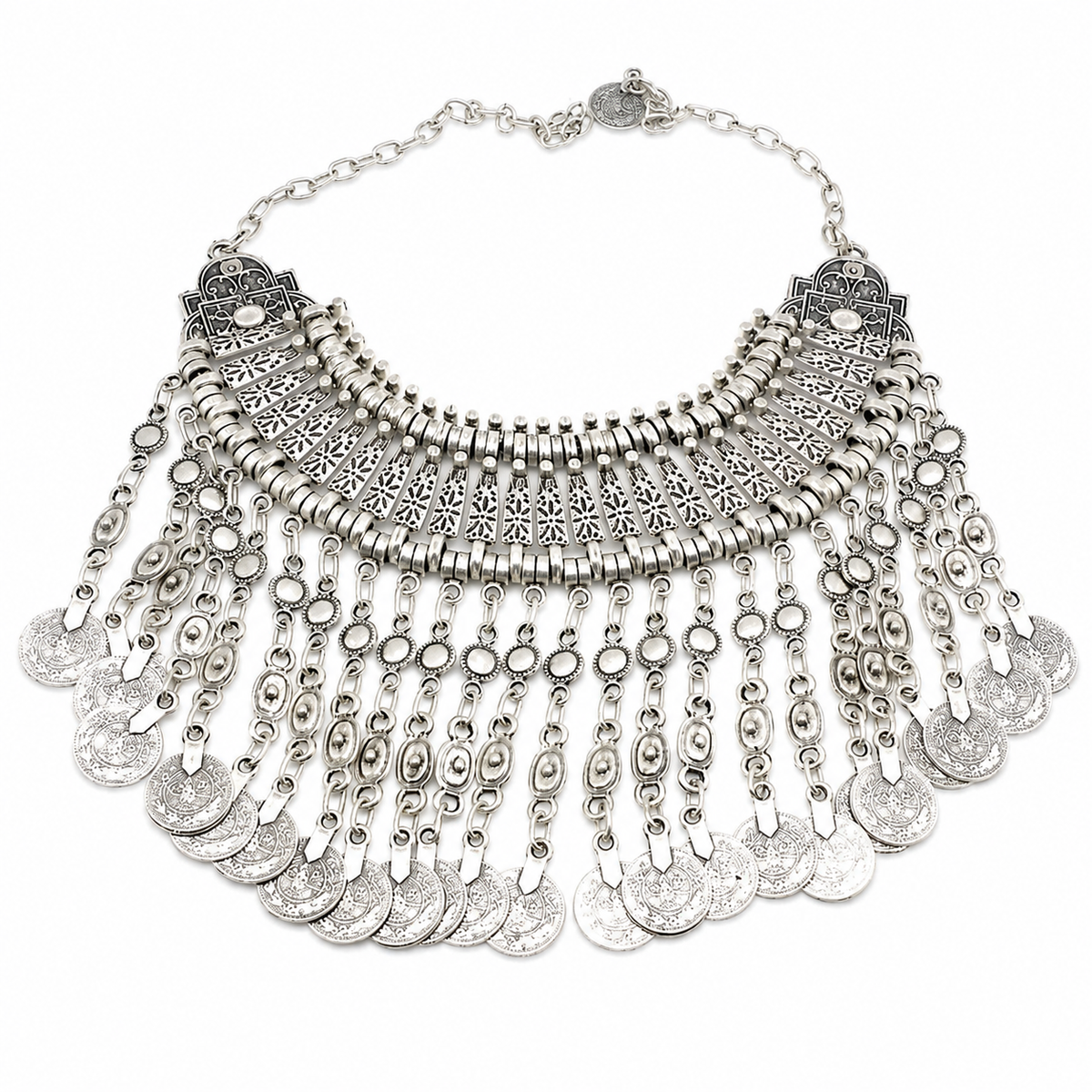 Silver-tone boho statement necklace with layered coin fringe and detailed cutout accents.
