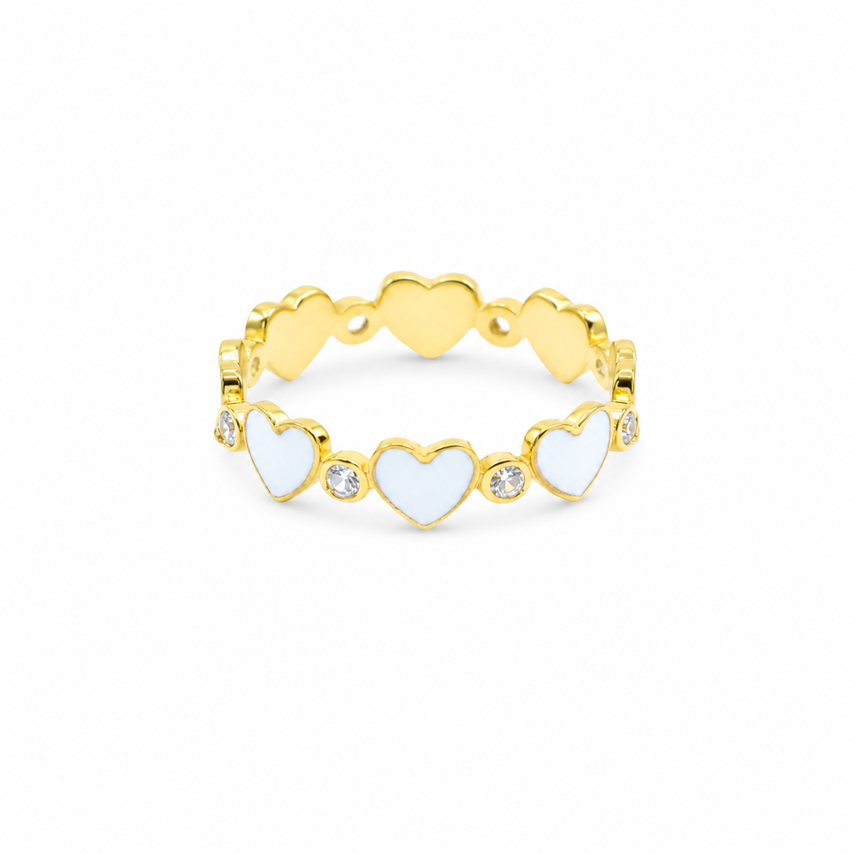 Gold-plated ring with white heart accents and small clear stones.
