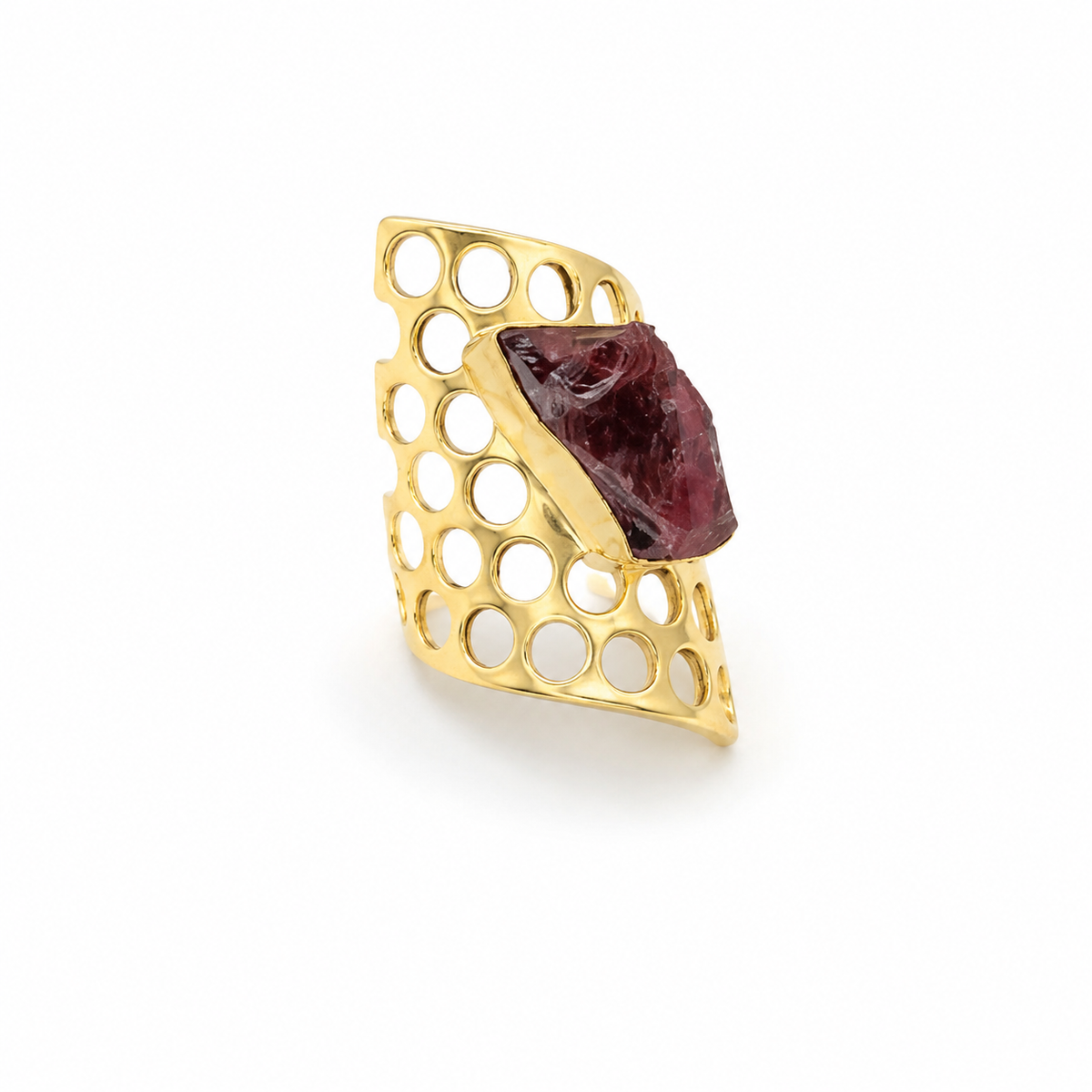 Raw garnet statement ring with a honeycomb-inspired gold-plated band.