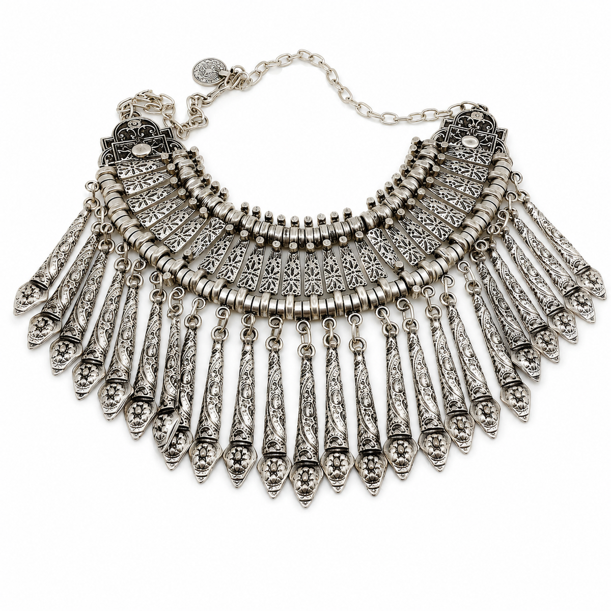 Silver-tone boho collar necklace with layered paddle fringe and intricate textured details.