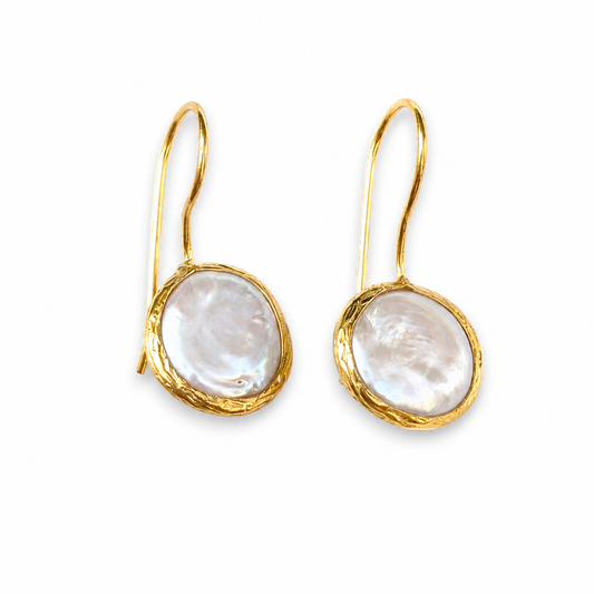 Gold-plated drop earrings with coin pearl centers on a white background.