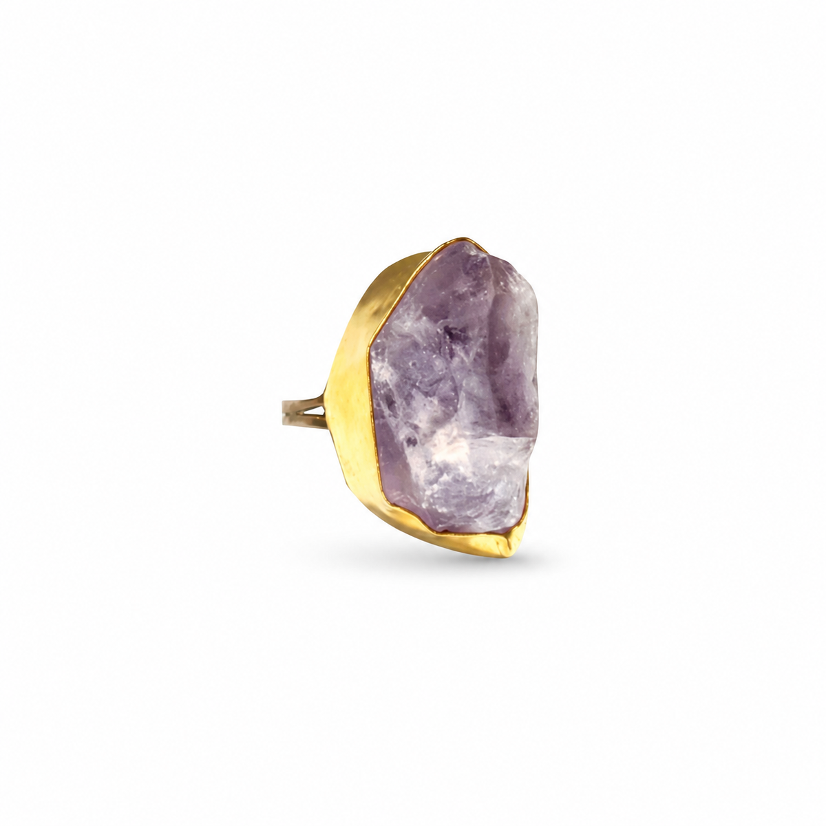 Raw amethyst statement ring with a gold-plated sculptural setting.