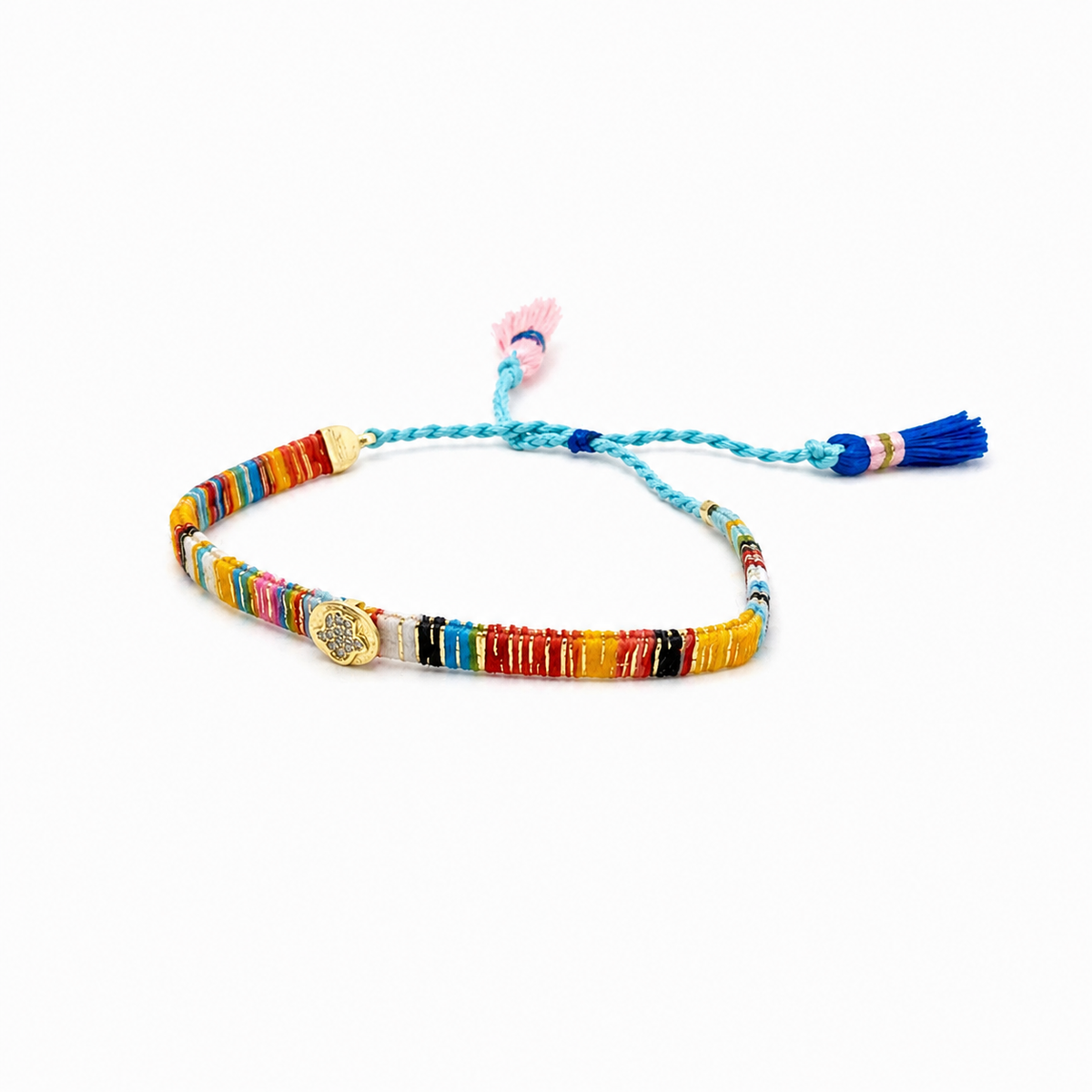 Colorful thread bracelet with a braided cord and gold-tone accents on a white background.