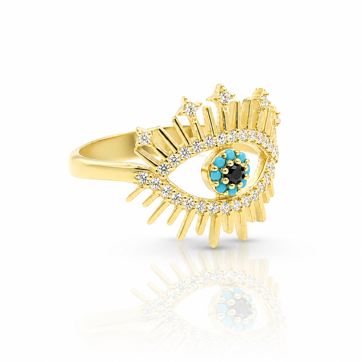 Gold-tone evil eye ring with sparkling accents and a vivid center detail.