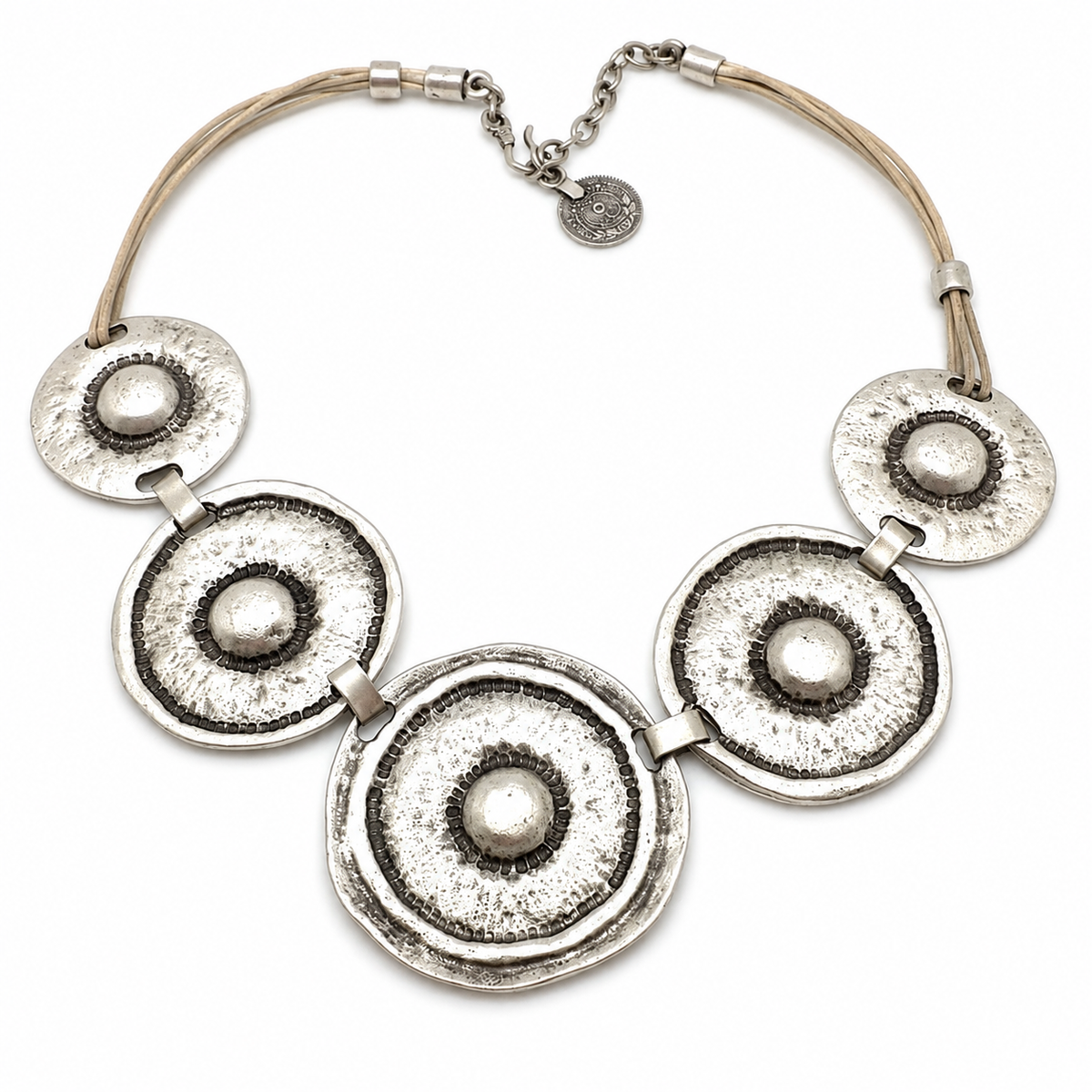 Hammered silver-tone circle statement necklace with textured round pendants.