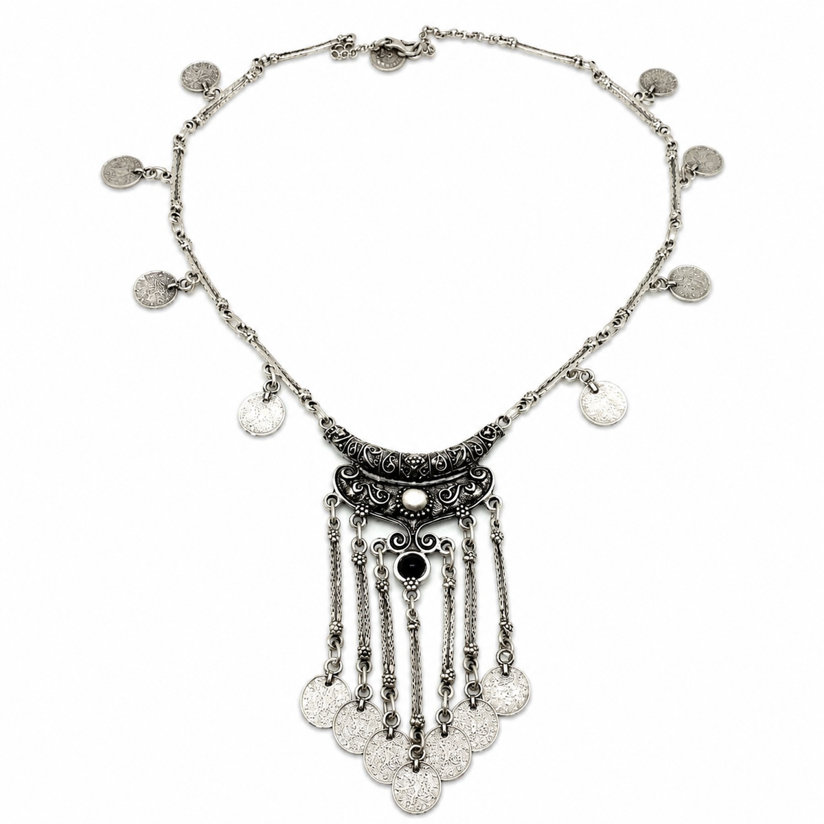 Silver-tone necklace with coin pendants, a black stone center, and tassel drops.