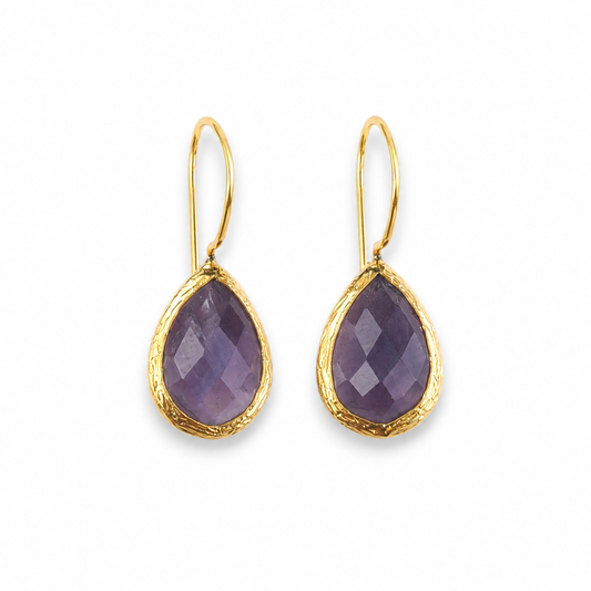 Pair of amethyst teardrop earrings with gold-plated hook settings.