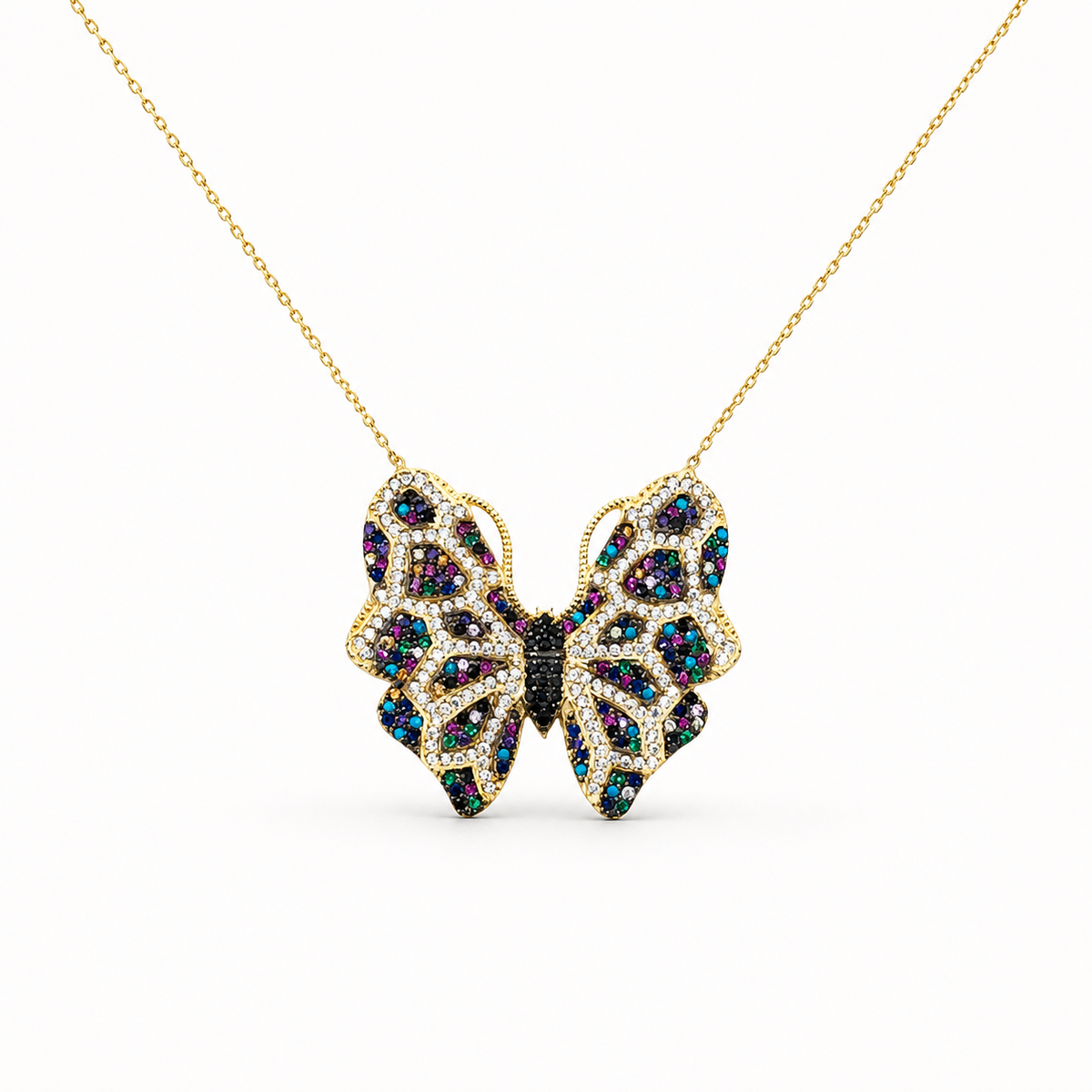Gold-tone butterfly necklace with multicolor CZ accents on a delicate chain.