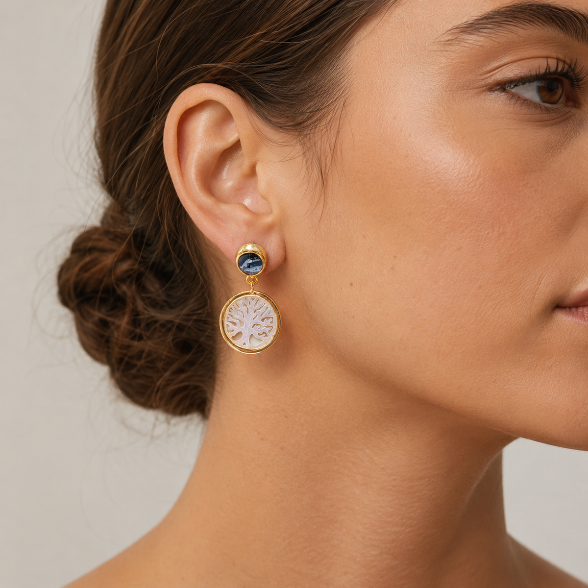 Gold-plated Tree of Life drop earrings shown from the front.