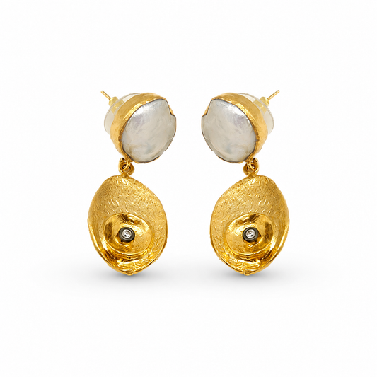 Pearl-like oval drop earrings with a hammered gold-plated finish.