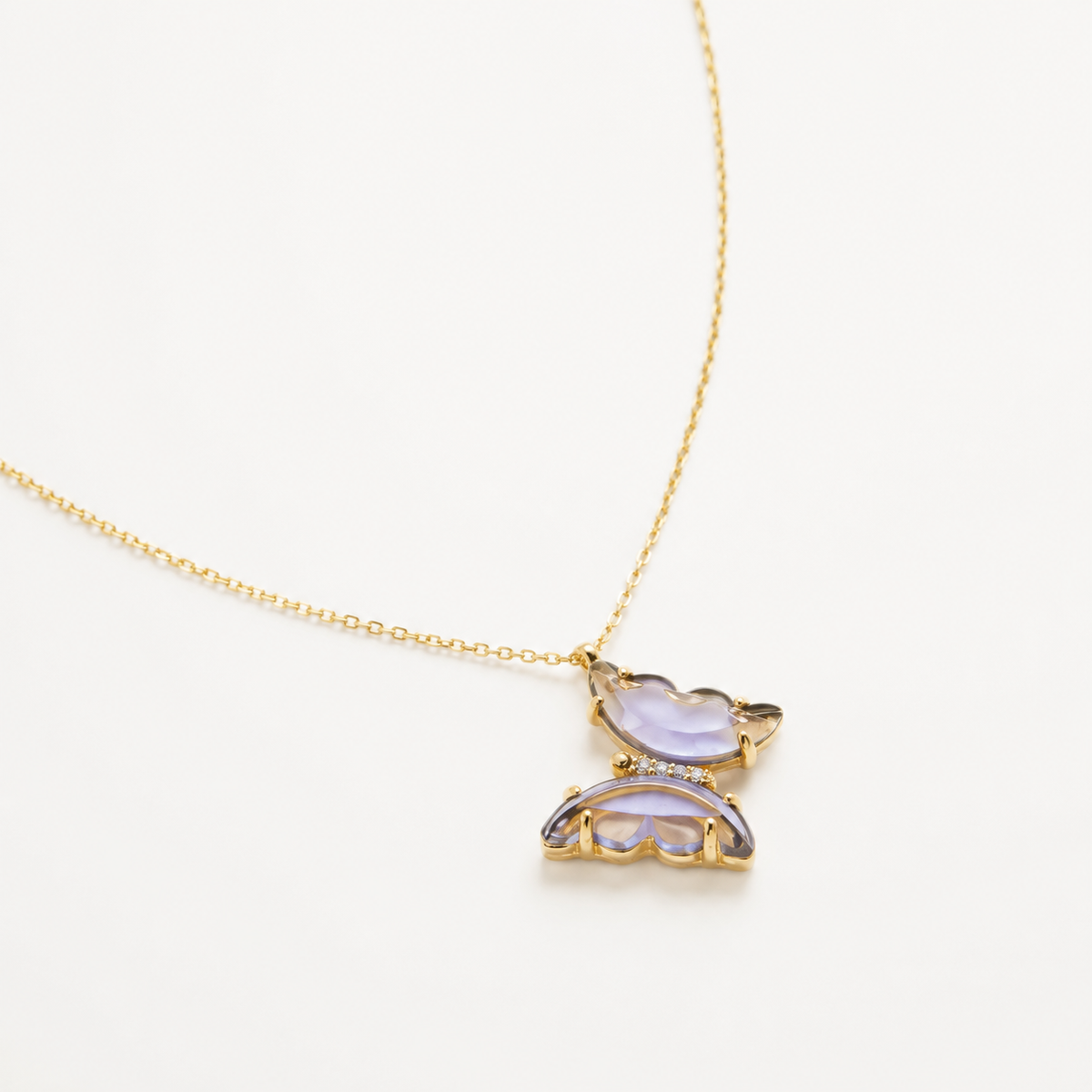 Angle view of the purple butterfly pendant necklace