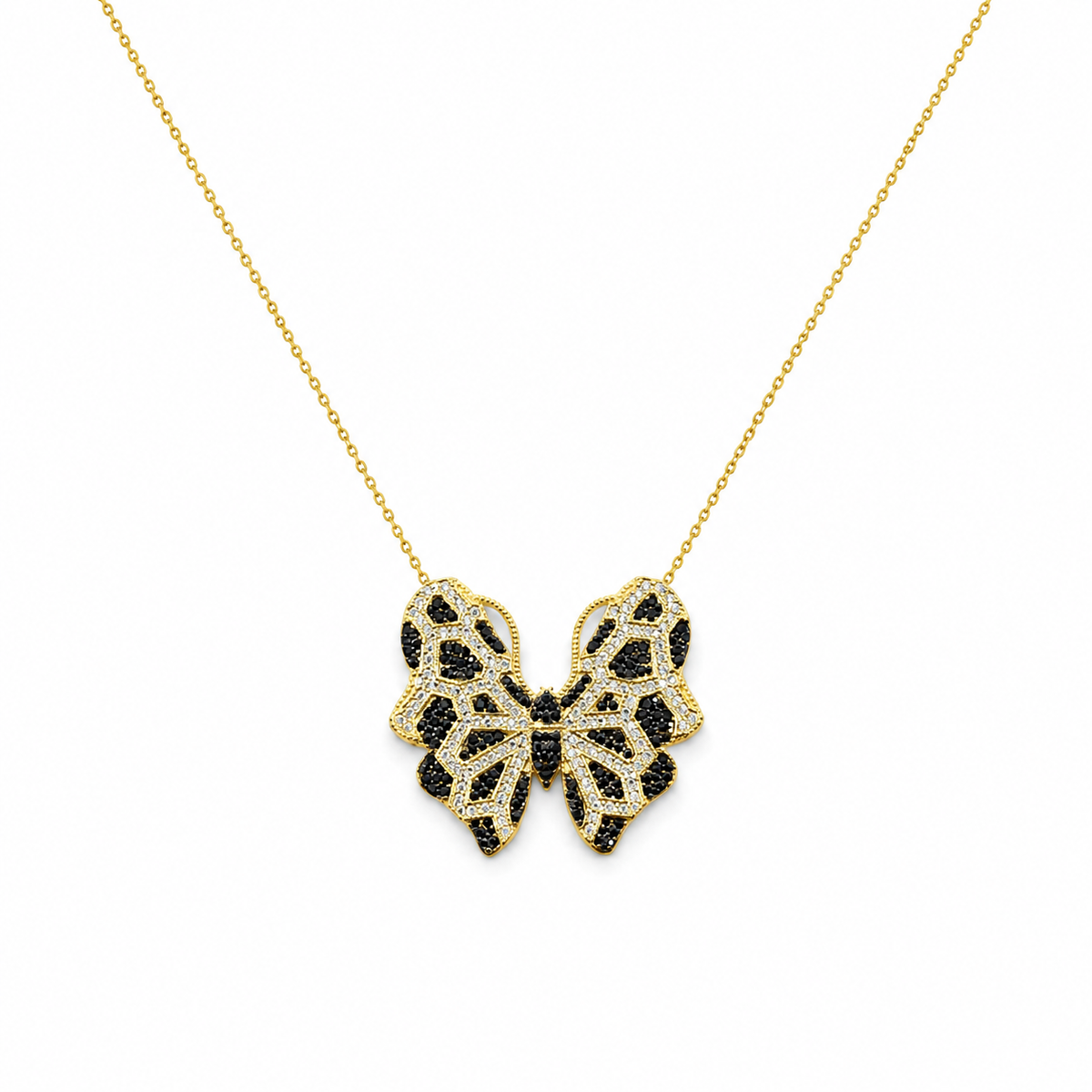 Gold-tone necklace with a butterfly pendant and multicolor CZ accents on a white background.