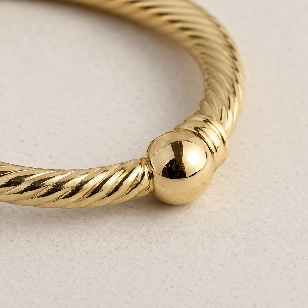 Close view of the twisted texture and polished ball ends.