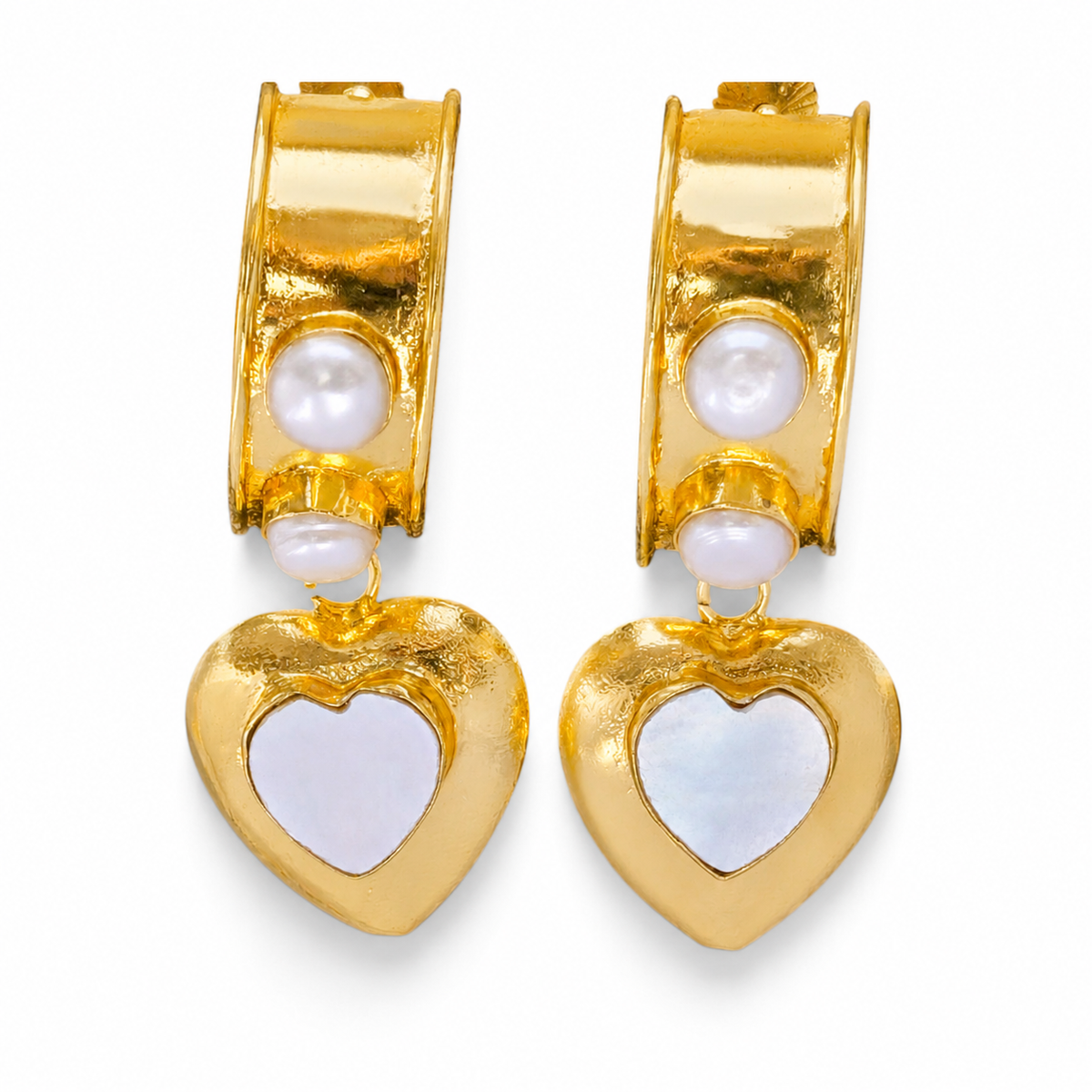 Gold-plated drop earrings with mother of pearl heart charms.