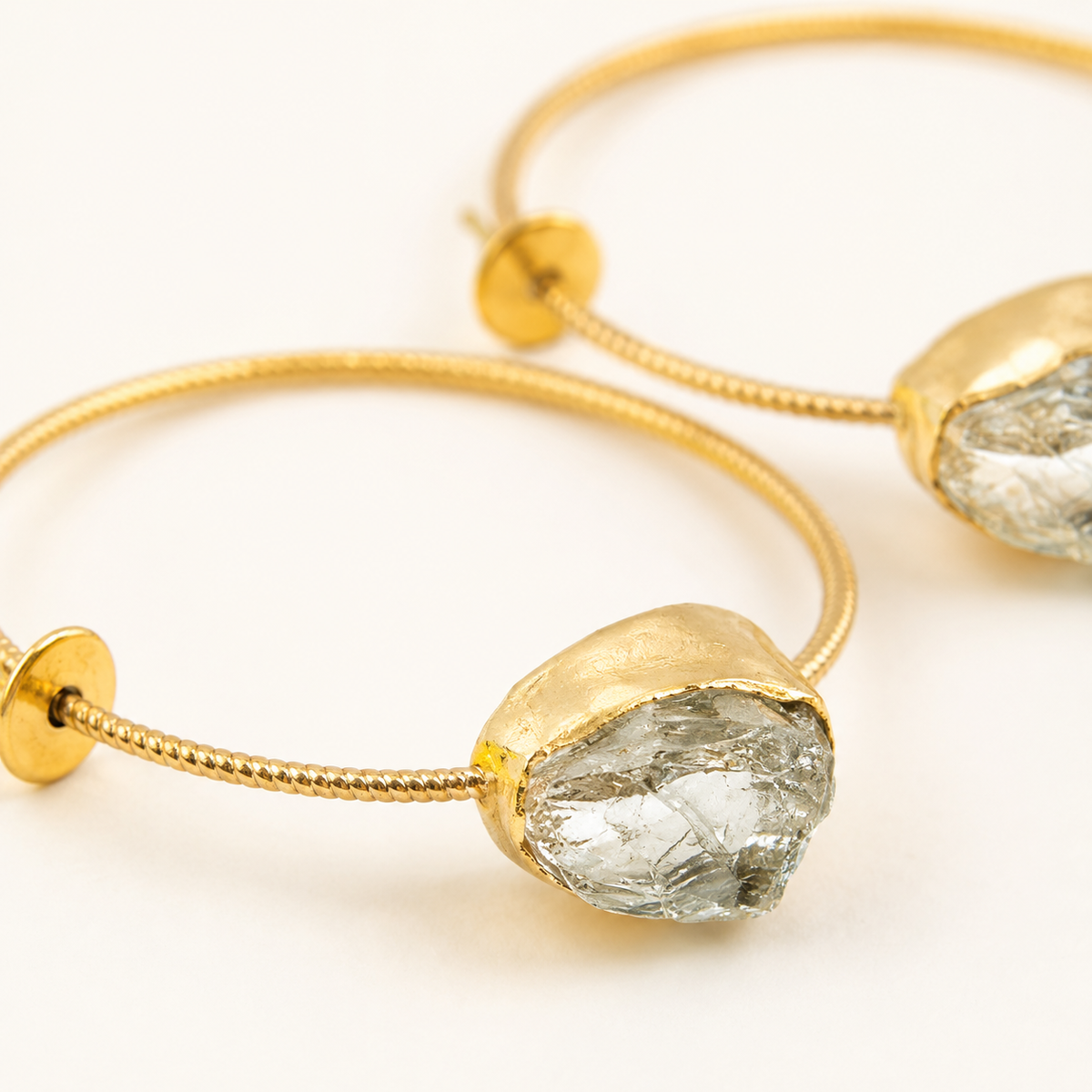 Close view of the yellow solar quartz stone and gold-plated setting.