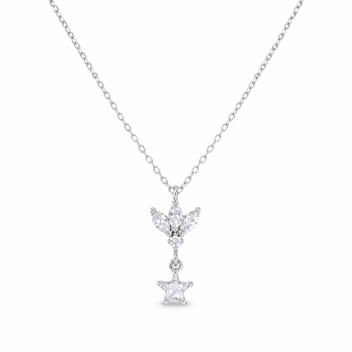 A silver-tone pendant necklace with a lotus-inspired charm and clear star drop.
