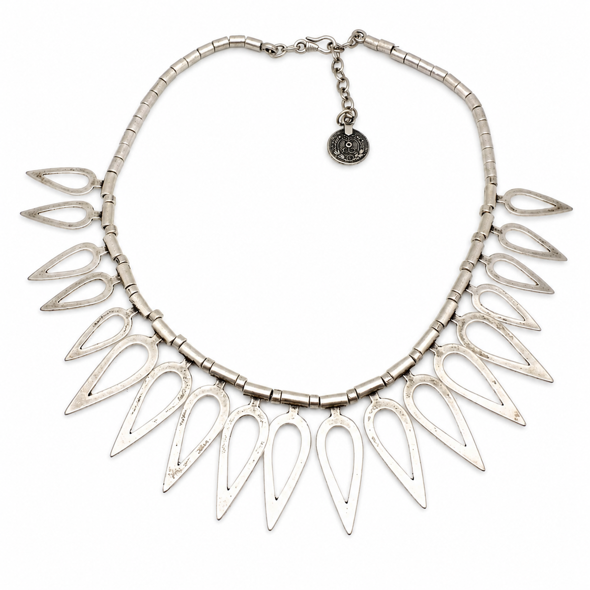 Silver-tone collar necklace with open teardrop links and a sculptural silhouette.