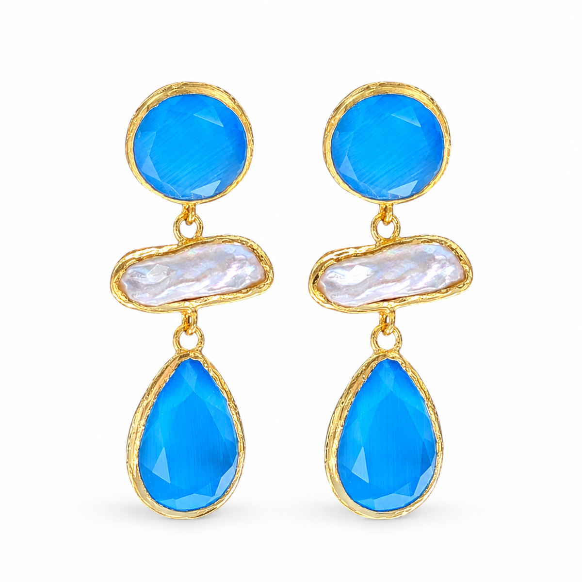 Gold-plated drop earrings with bright blue faceted stones and a pearl-like center.