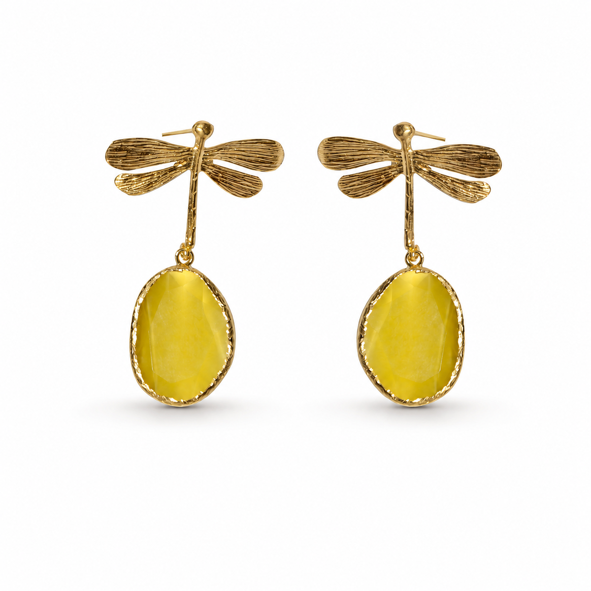 Pair of gold dragonfly drop earrings with mustard-toned oval drops.