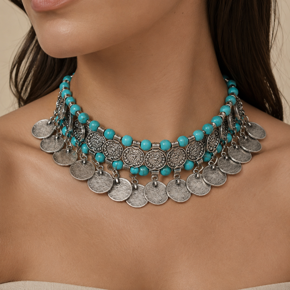Turquoise bead choker necklace with layered silver-tone coin fringe.