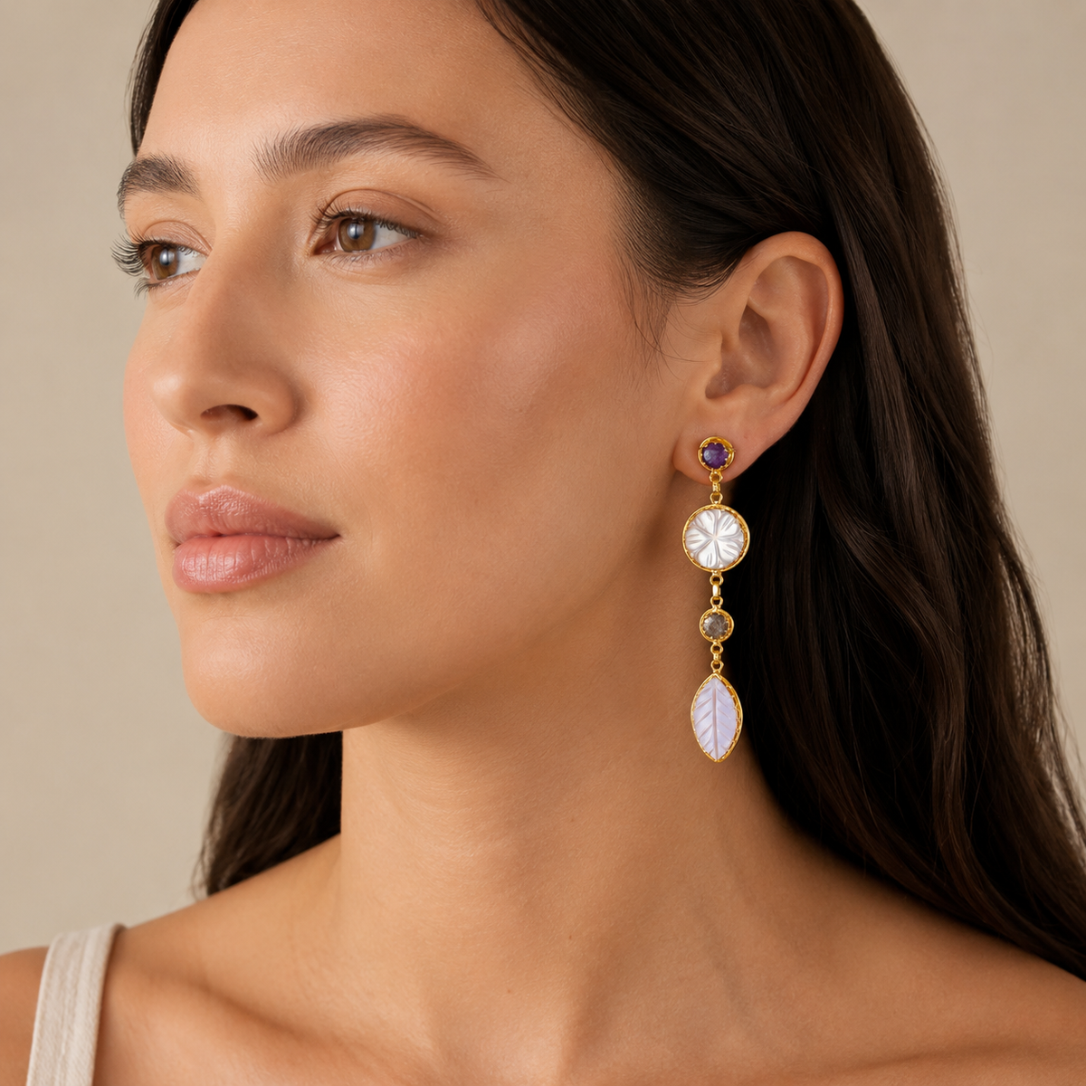 Gold-plated drop earrings with mother of pearl and rose quartz-style stones.