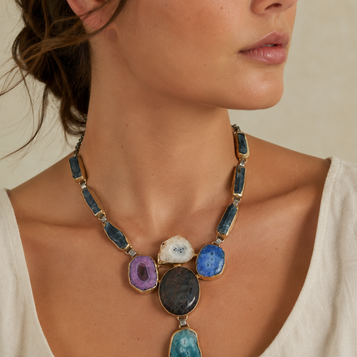 Multi stone agate statement necklace shown front view on a white background.