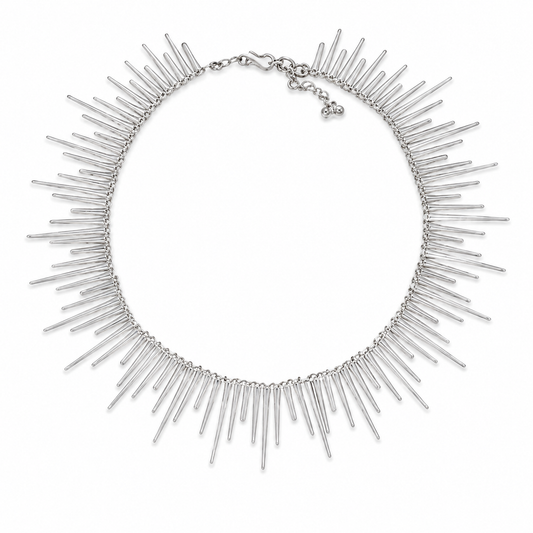 Silver-tone collar necklace with long spike details arranged around the neckline.