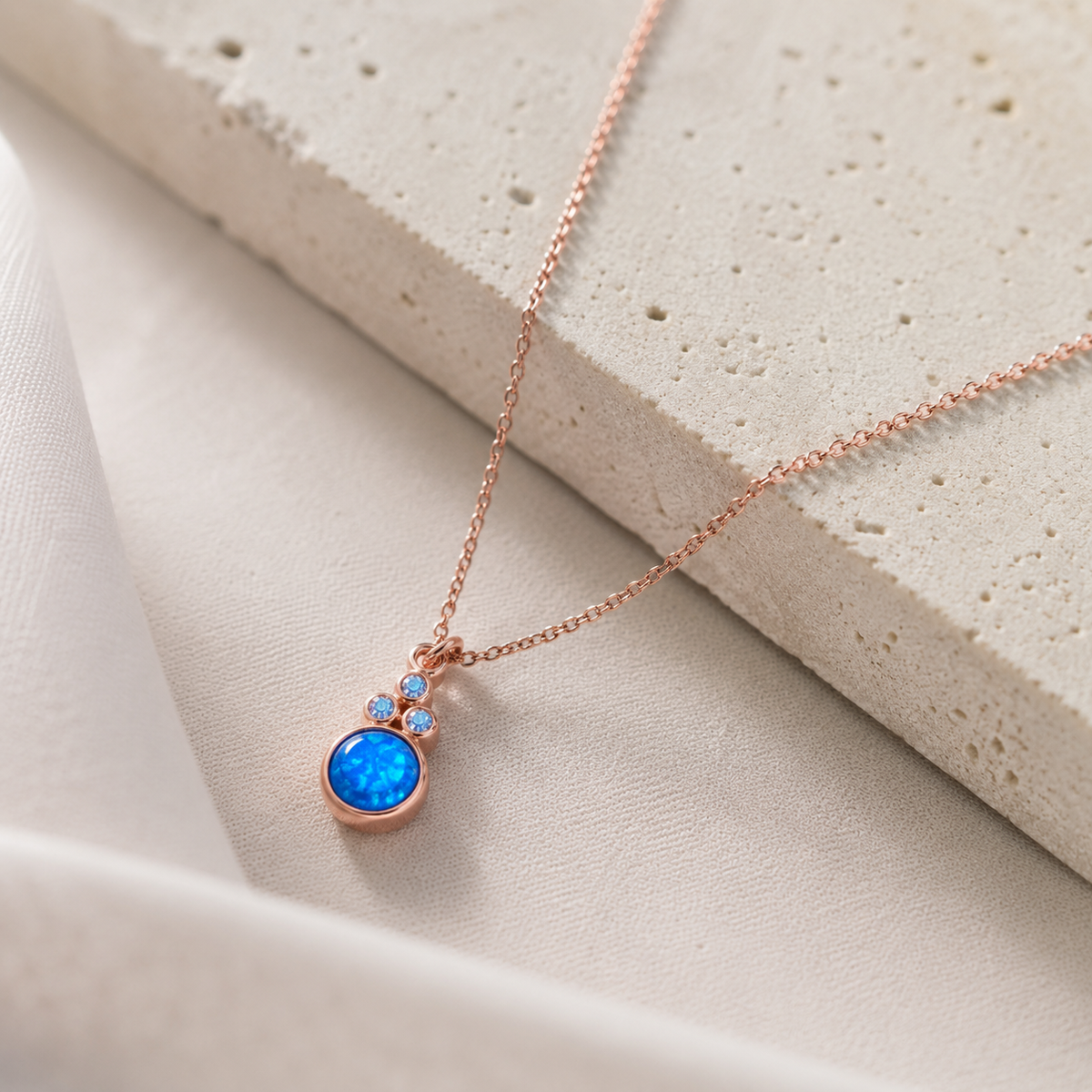 Blue opal necklace shown as a simple pendant style.