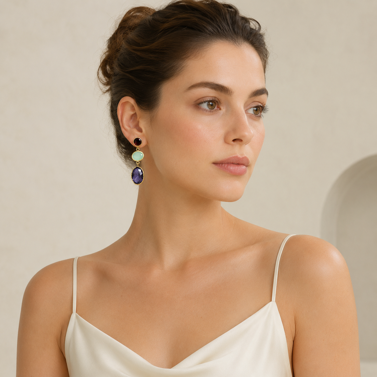 Colorful triple drop earrings with a polished gold-plated finish.
