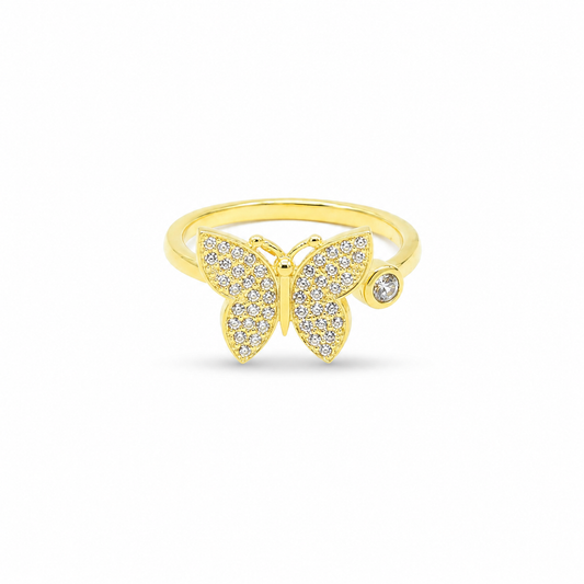Gold-plated butterfly statement ring with sparkling CZ accents.