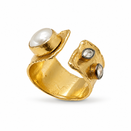 Gold-plated open cuff ring with a pearl-like center and clear CZ accents.